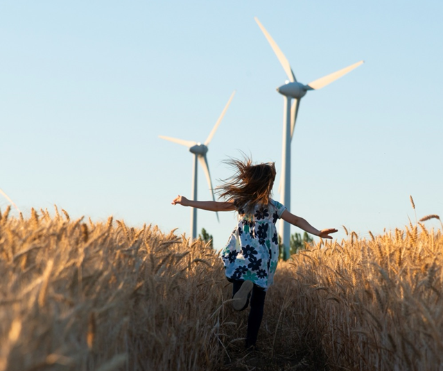 photo of windmill with girl